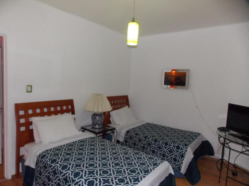 Steinhaus Suites Homero Mexiko-Stadt Zimmer foto
